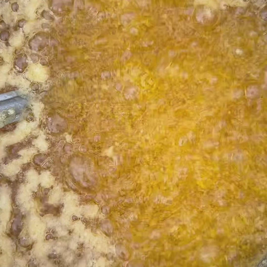 Grandma making GHEE