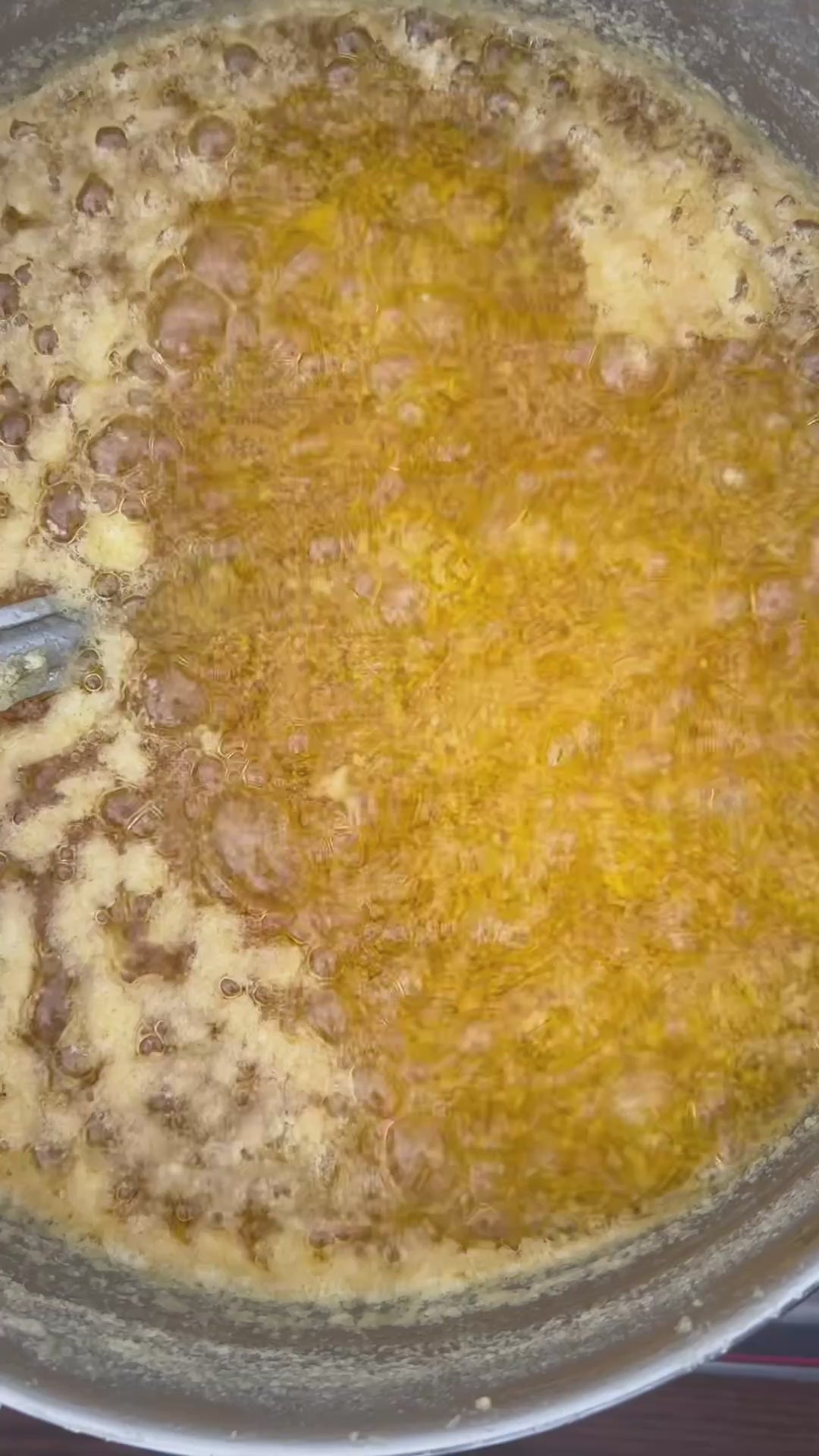 Grandma making GHEE